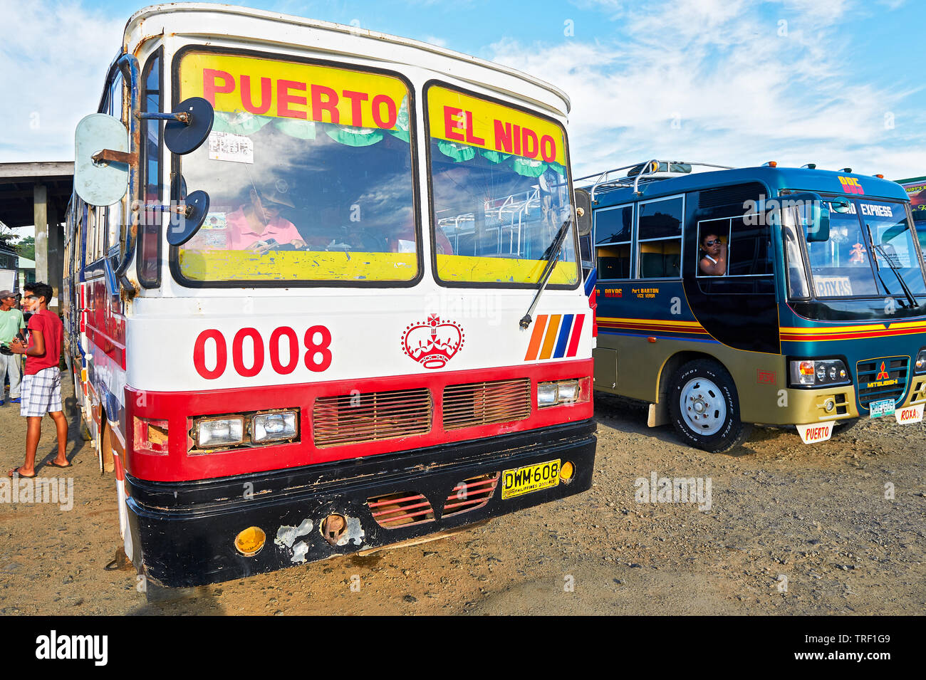 Puerto Princesa City, Palawan, Philippines - March 8, 2011: Front view of  two old overland buses waiting for passengers at the bus terminal Stock  Photo - Alamy