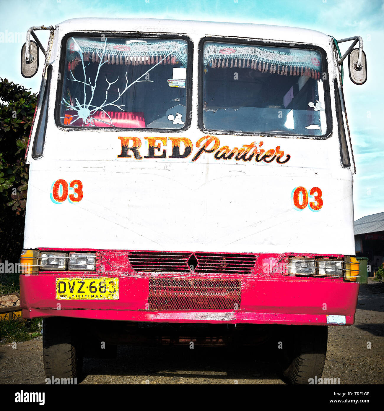 Puerto Princesa City, Palawan, Philippines: Front view of an old overland bus waiting for passengers at the bus terminal Stock Photo