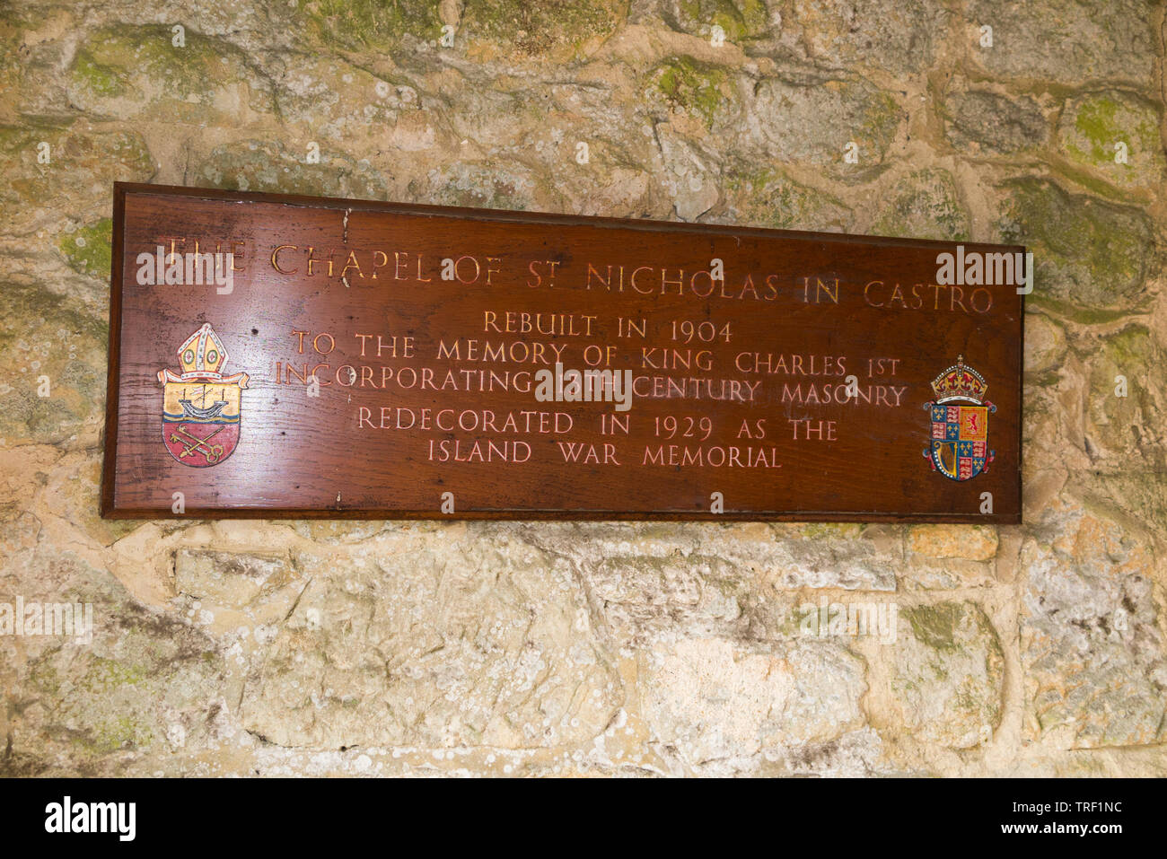 Information plaque / board / dedication at entrance of Chapel of St Nicholas-in-Castro. Carisbrooke Castle on the Isle of Wight. UK. (99) Stock Photo
