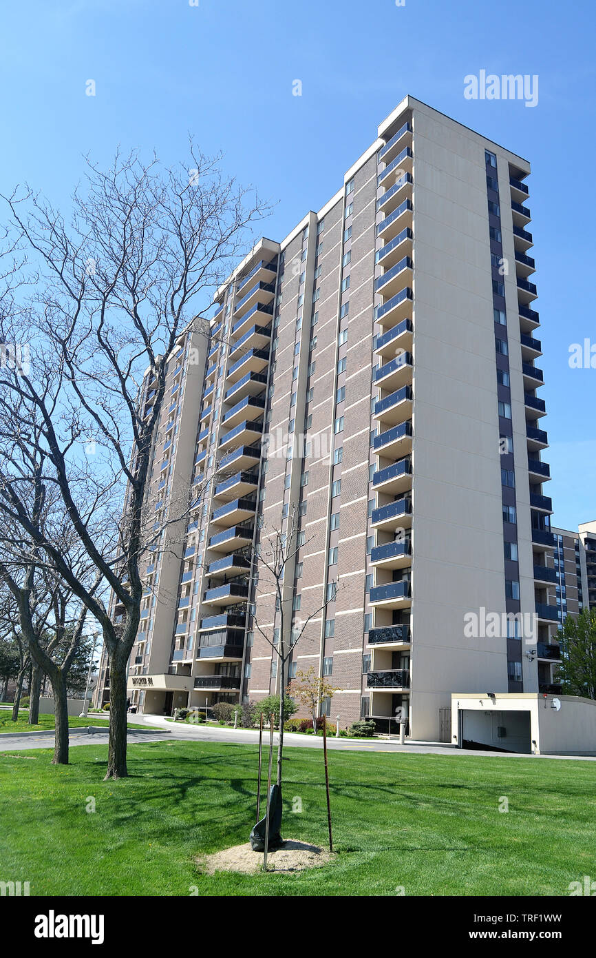 A older high rise building in Hamilton Canada in the spring of 2019 in bright sunlight Stock Photo