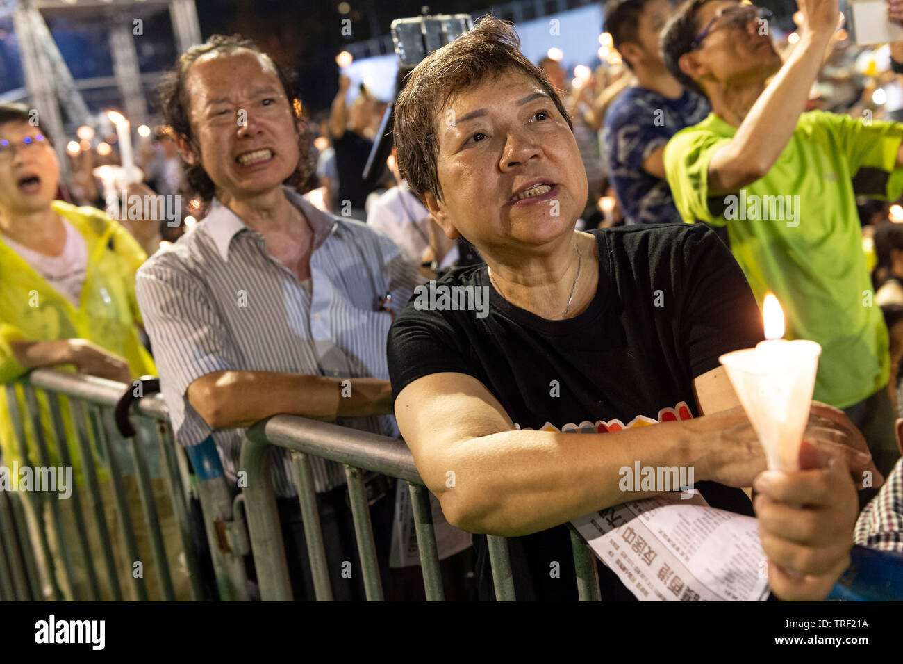 Hong Kong. 04th June, 2019. A candlelit vigil takes place in Hong Kong’s Victoria Park to mark the 30th Anniversary of the Tiananmen Square massacre in Beijing China in 1989. As the only location on Chinese soli that such a rally is allowed, the crowds are overflowing people fear the ever deteriorating human rights in China. Alamy Live News Credit: Jayne Russell/Alamy Live News Stock Photo