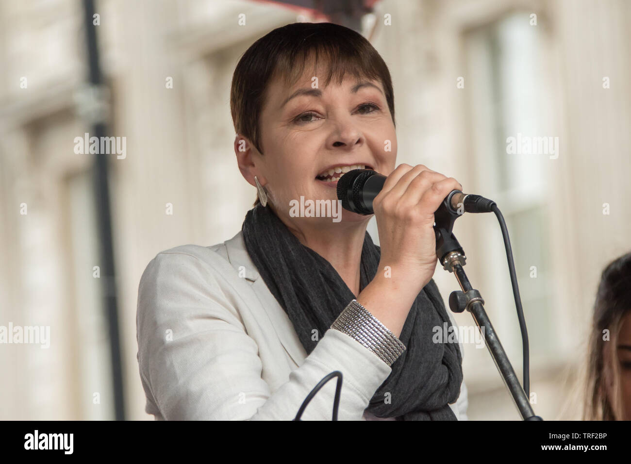 4 June ,2019.. London,UK. Caroline Lucas, Green Party MP addresses the crowd on Whitehall. Tens of Thousands protest in Central London in a National demonstration against US President Donald Trumps State visit to the UK. Protesters rallied in Trafalgar Square before marching down Whitehall to Downing Street, where Trump was meeting UK Prime Minister Theresa May. David Rowe/Alamy Live News. Stock Photo
