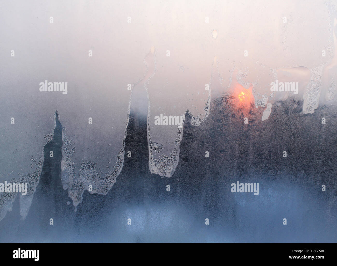 ice and sun on windowpane, winter background Stock Photo - Alamy