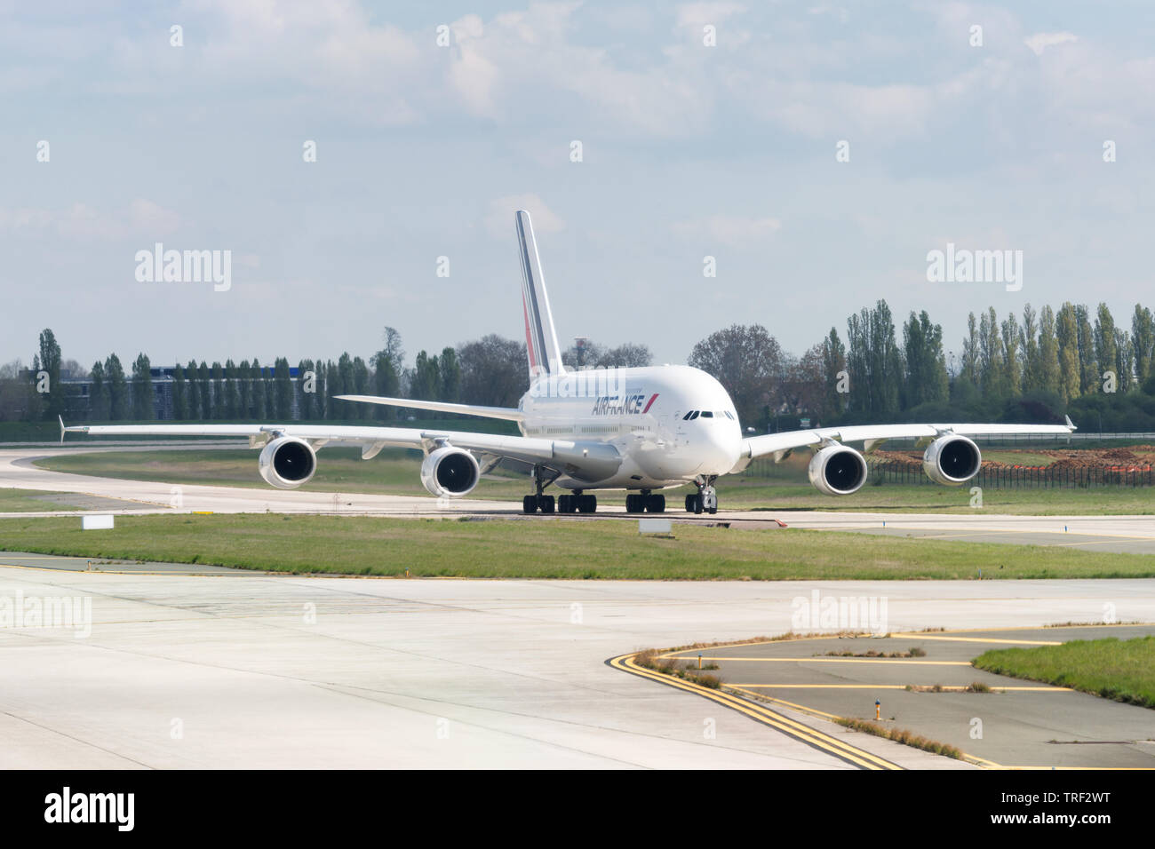 Long range four engines Airbus A380 arrival on a taxiway, Air France company, Paris, France Stock Photo