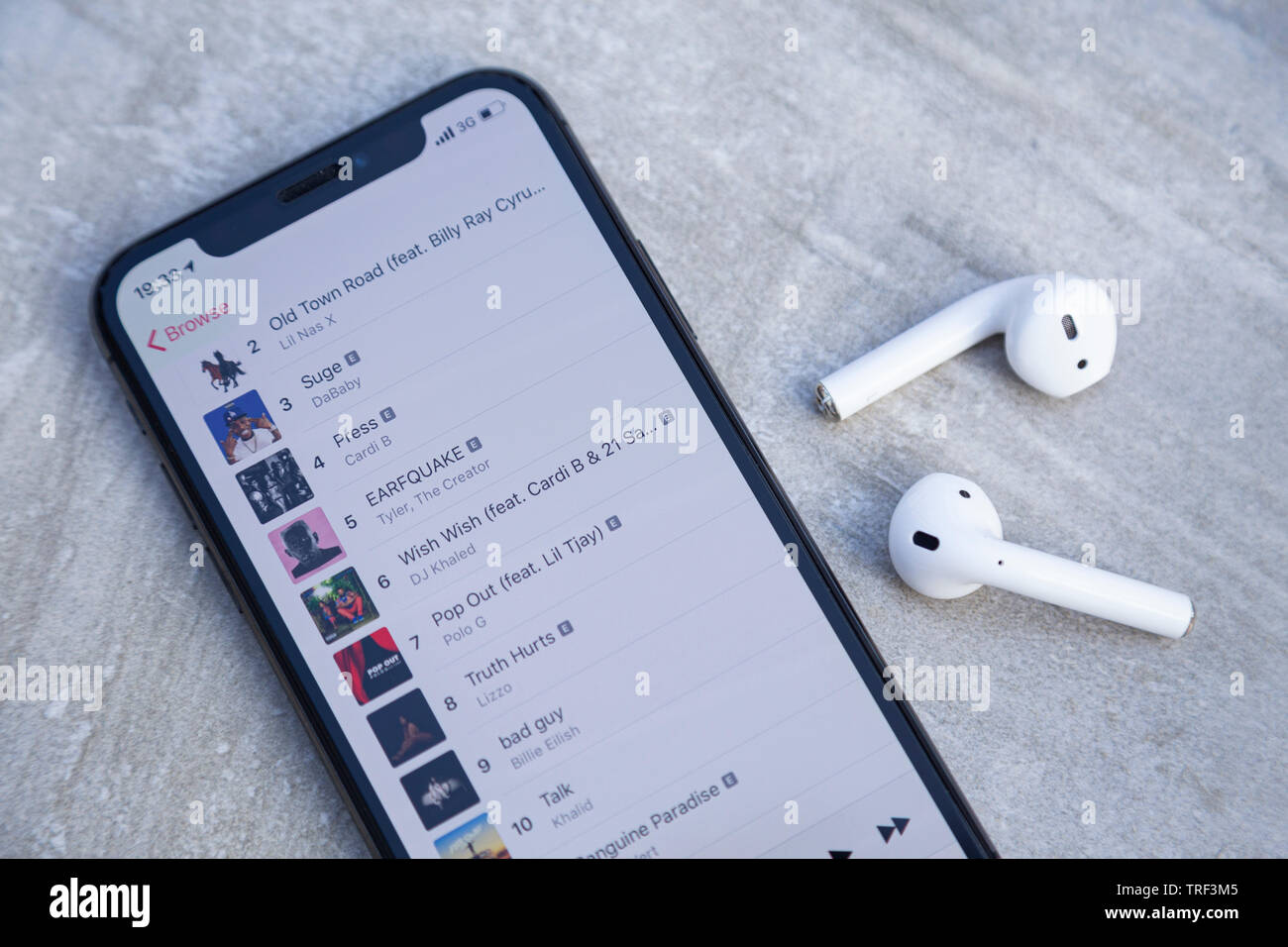 Eppelheim, Baden Württemberg / Germany 06 03 2019: Apple iPhone X with  Apple Music Main Screen and AirPods with Case Stock Photo - Alamy