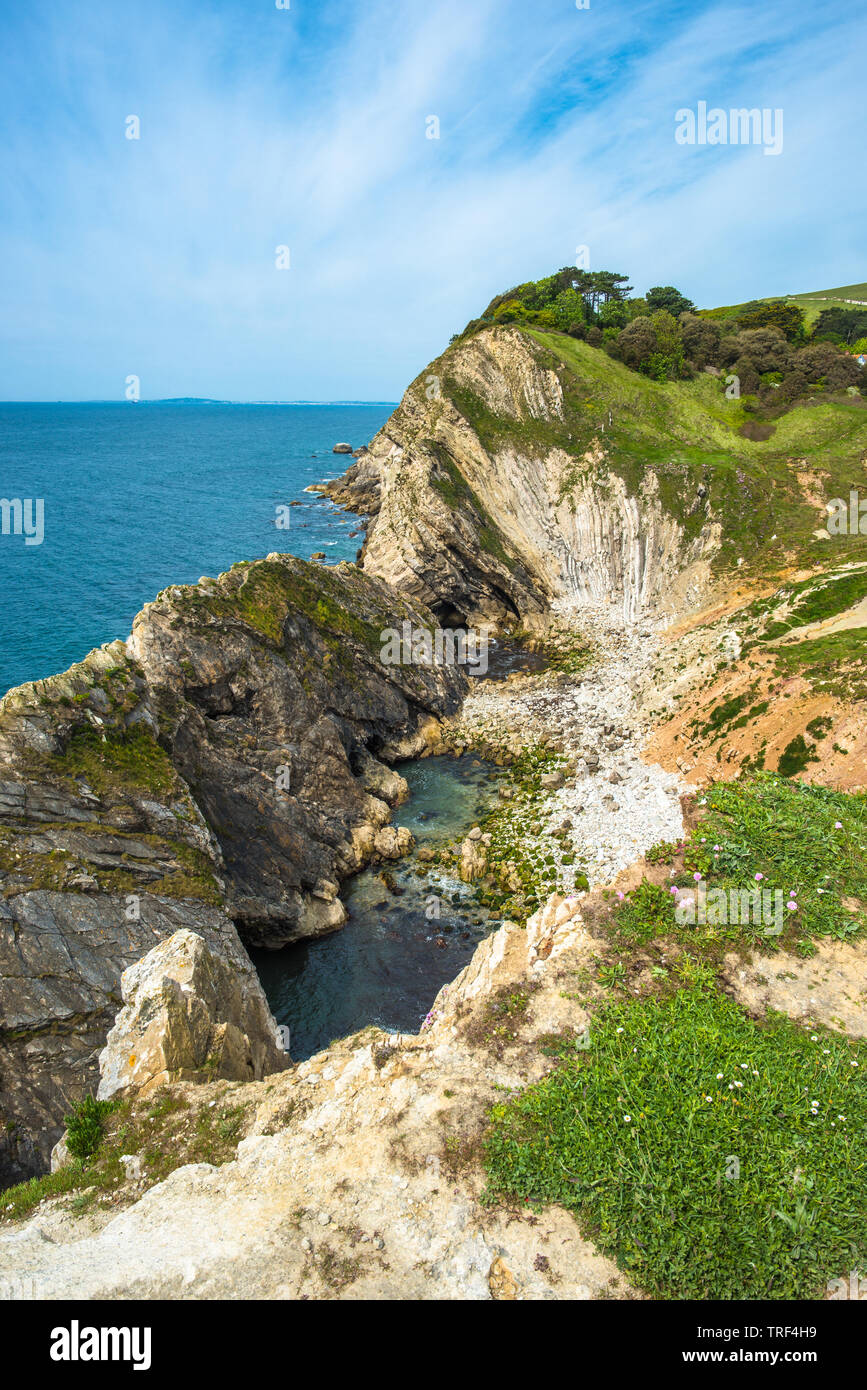 Stair Hole at Lulworth Cove is dramatic coastal scenery on the Dorset Jurassic coast in England, UK. Stock Photo