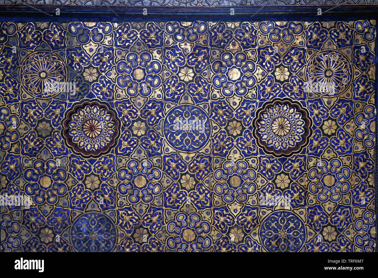 Cairo, Egypt - March 01, 2010: Luxurious Gold and Blue Mosque Ceiling at Qalawun Complex in Cairo, Egypt. Stock Photo