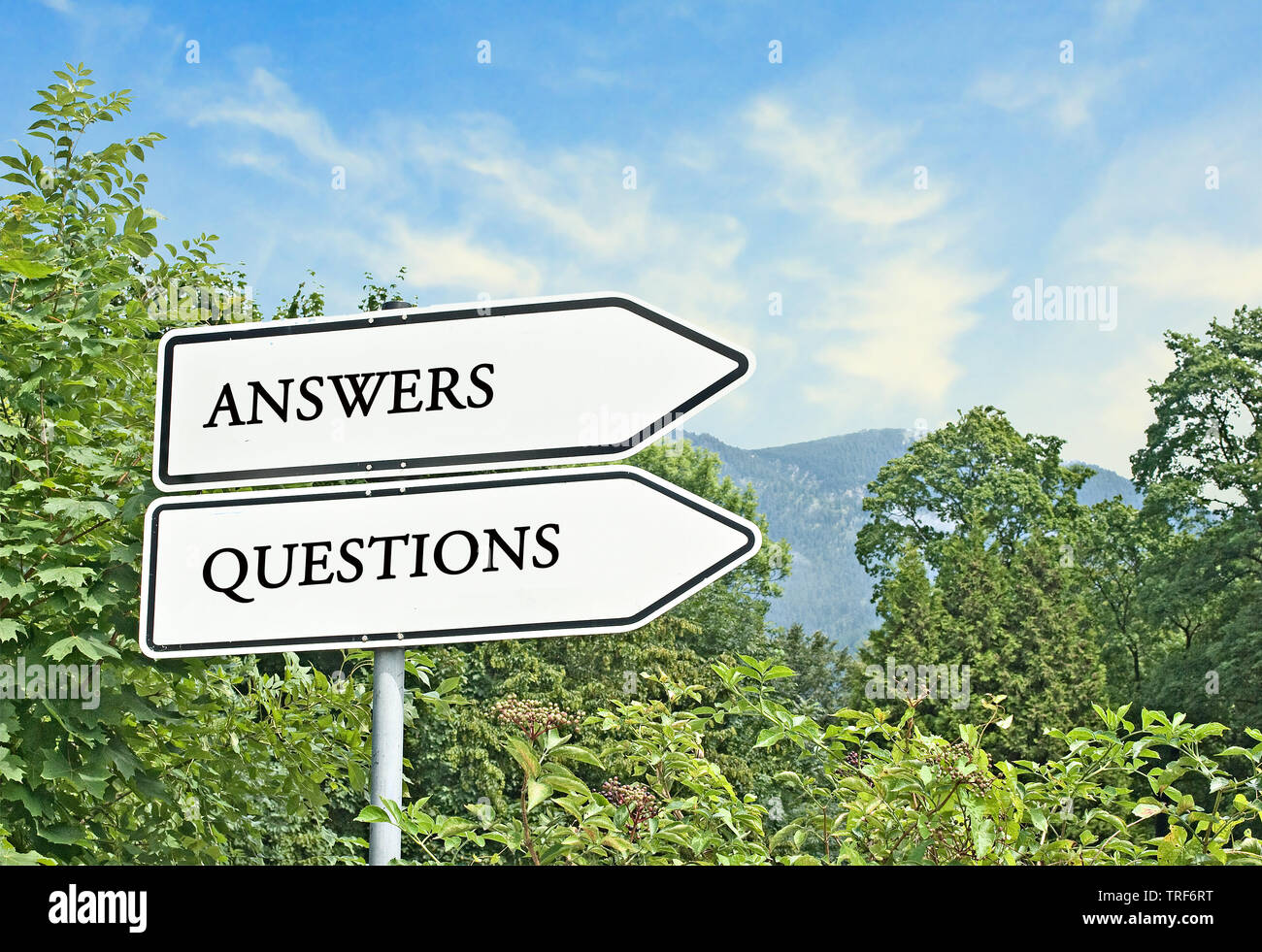 Road signs to answers and questions Stock Photo Alamy