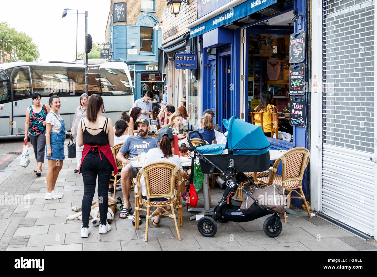 Alfresco diners outside the Gallipoli bistro on Upper Street, London, UK Stock Photo