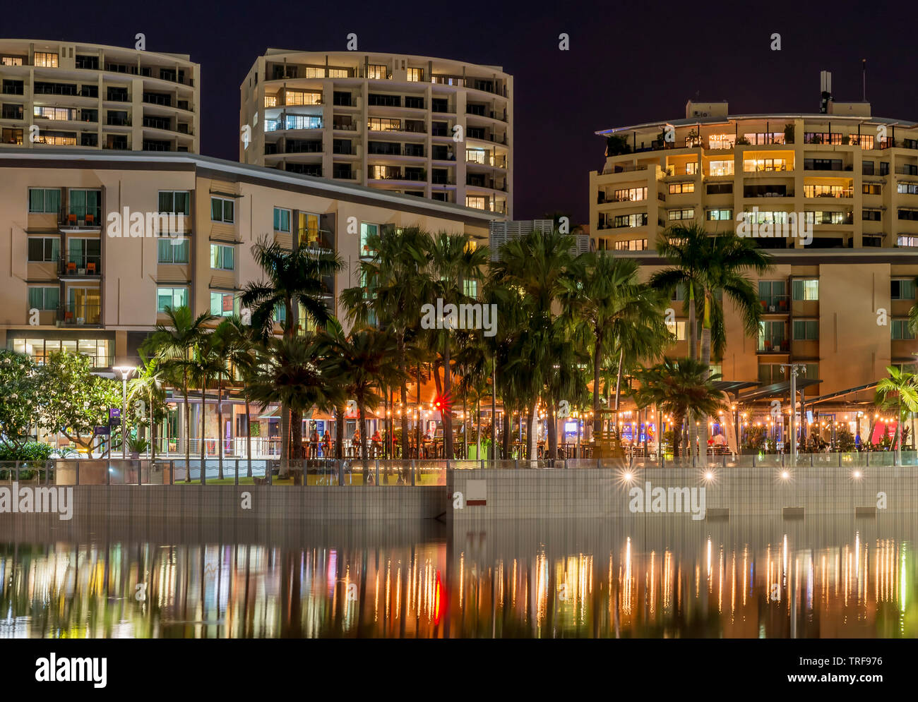 The beautiful Waterfront of Darwin, Australia, seen with the reflection in the water in the evening light Stock Photo