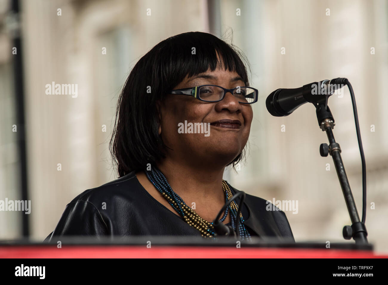4 June ,2019.. London,UK. Diane Abbott, Labour MP and Shadow Home Secretary addresses the crowd on Whitehall. Tens of Thousands protest in Central London in a National demonstration against US President Donald Trumps State visit to the UK. Protesters rallied in Trafalgar Square before marching down Whitehall to Downing Street, where Trump was meeting UK Prime Minister Theresa May. David Rowe/Alamy Live News. Stock Photo