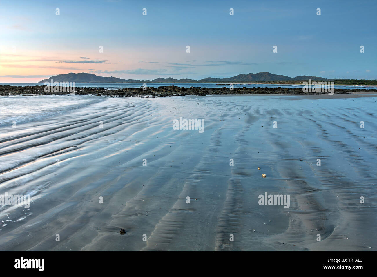 Tamarindo beach at sunset and low tide in Guanacaste, Costa Rica. Stock Photo