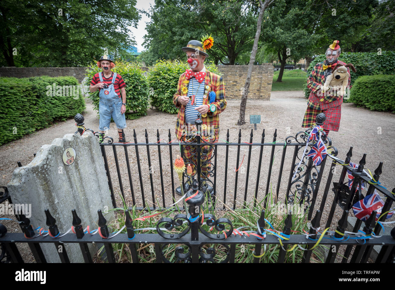 Annual Joseph Grimaldi Clown Memorial Day gathering at his grave in north London, UK. Stock Photo