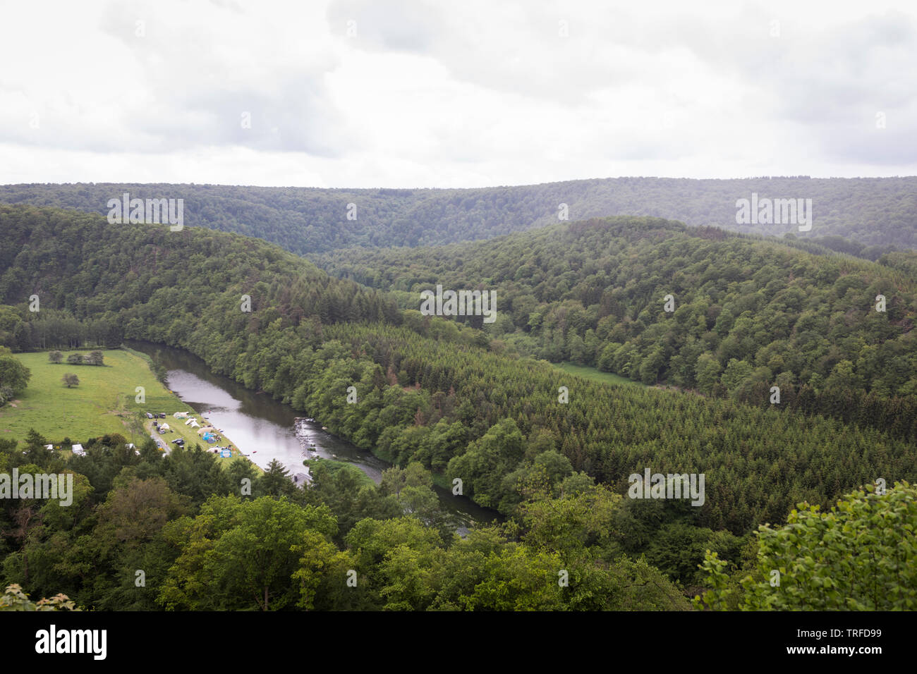 River Semois streaming along a camping and woods in Herbeumont, Belgium Ardennes Stock Photo