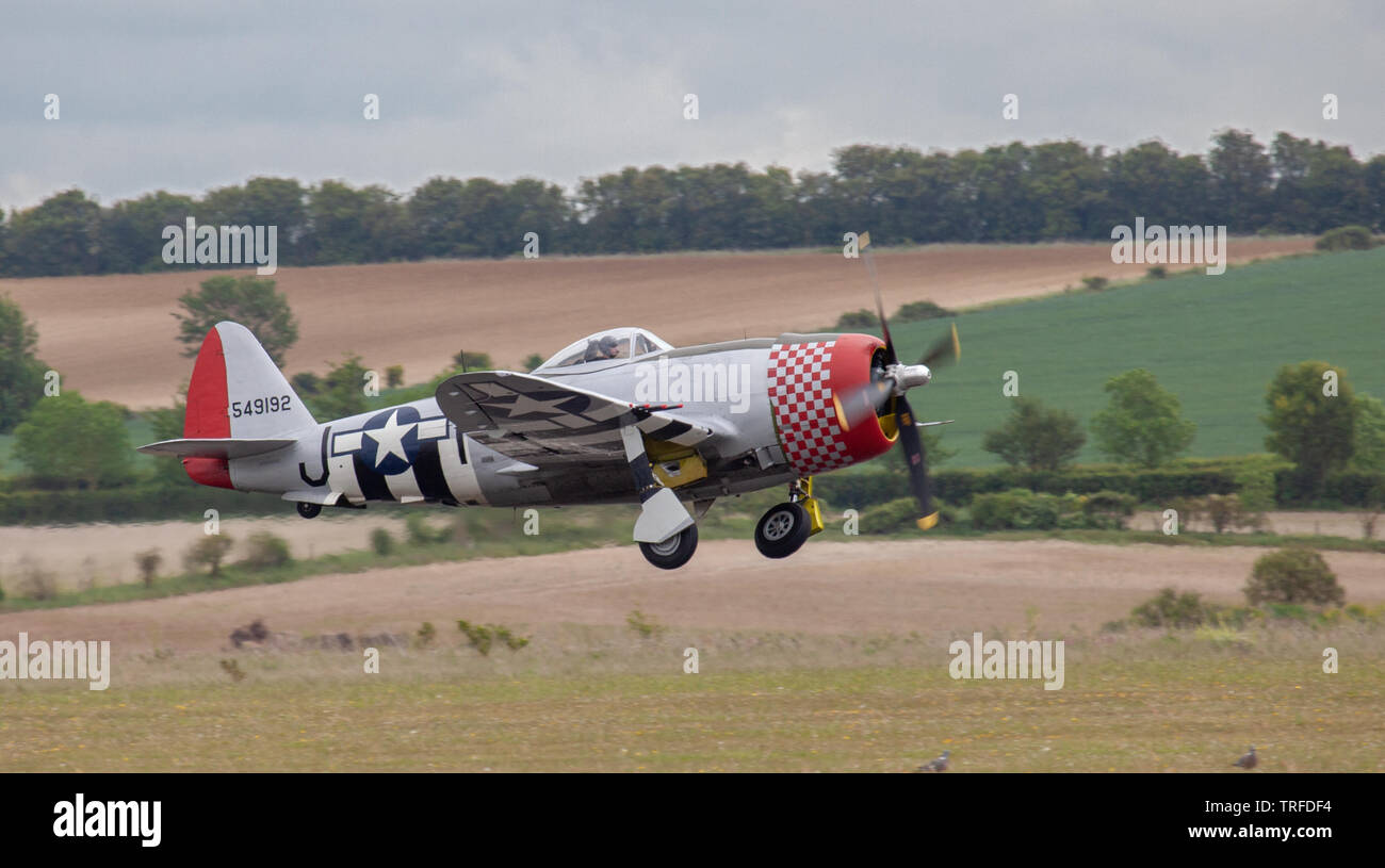 Republic P-47D Thunderbolt F4-J taking off from Duxford Aerodrome Stock Photo