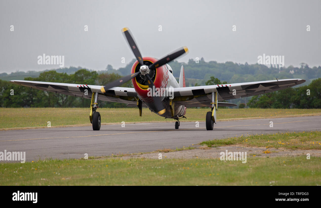 Republic P-47D Thunderbolt F4-J taxiing at Duxford Aerodrome Stock Photo