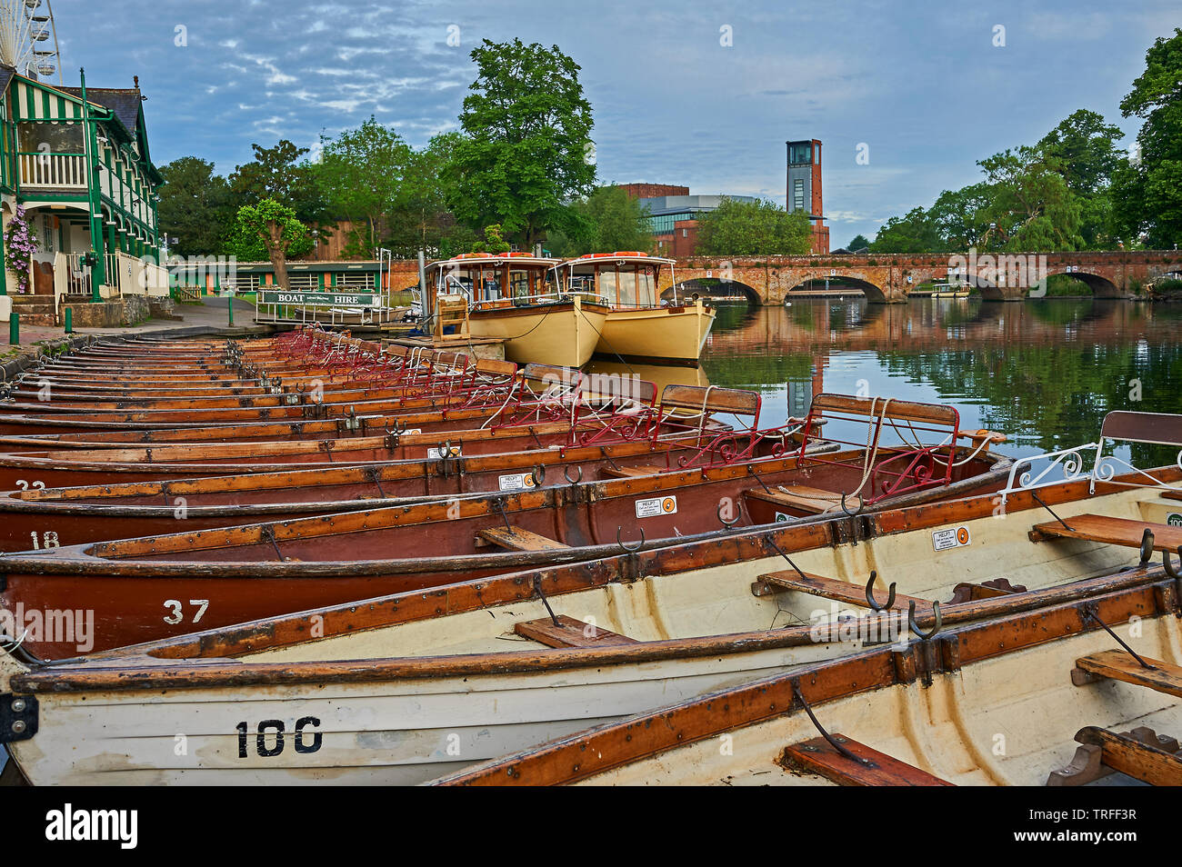 Stratford upon Avon, Warwickshire and boats moored on the River Avon early on a summer morning. Stock Photo