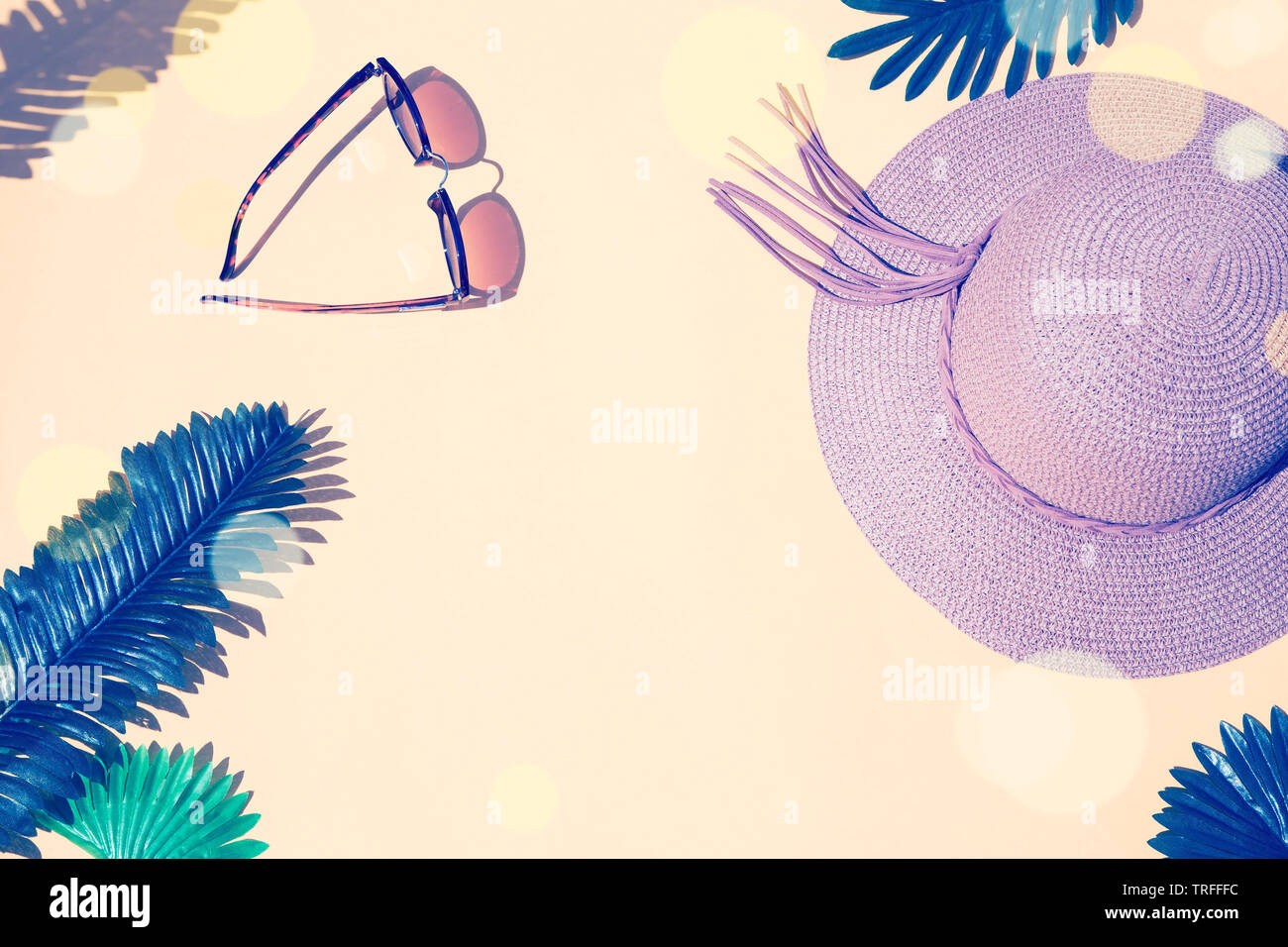 Summer background with a sunglasses and hat - toned image Stock Photo ...