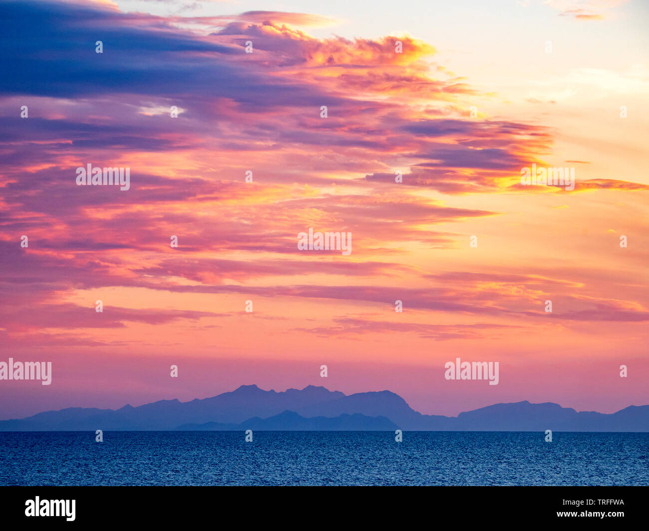 Sunset Cala Blanca, Menorca, Balearic Islands, view of Majorca, Spain Stock Photo