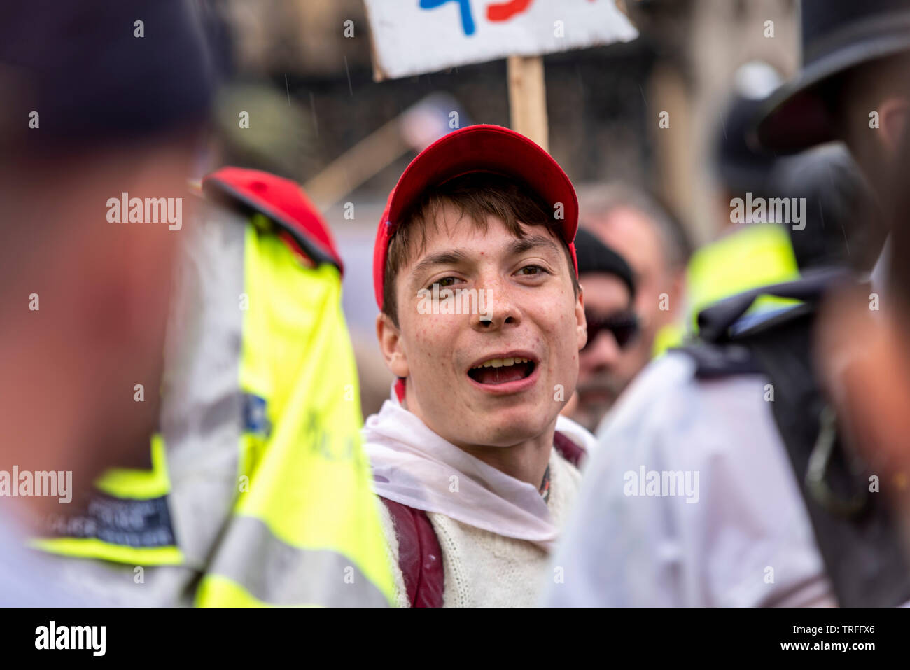 Max Hammet Millay, Trump supporter behind police cordon during anti Trump march in Whitehall London, UK during US President Donald Trump state visit Stock Photo