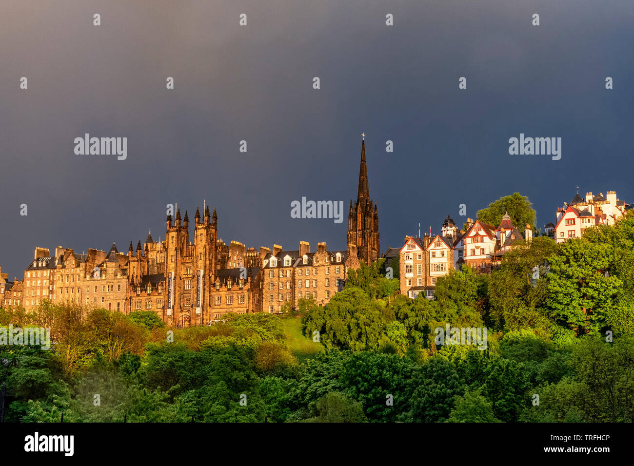 View Of The Mound St Giles Cathedran Spire And Ramsay Gardens From Princes Street In Dramatic Low Light Edinburgh Stock Photo Alamy