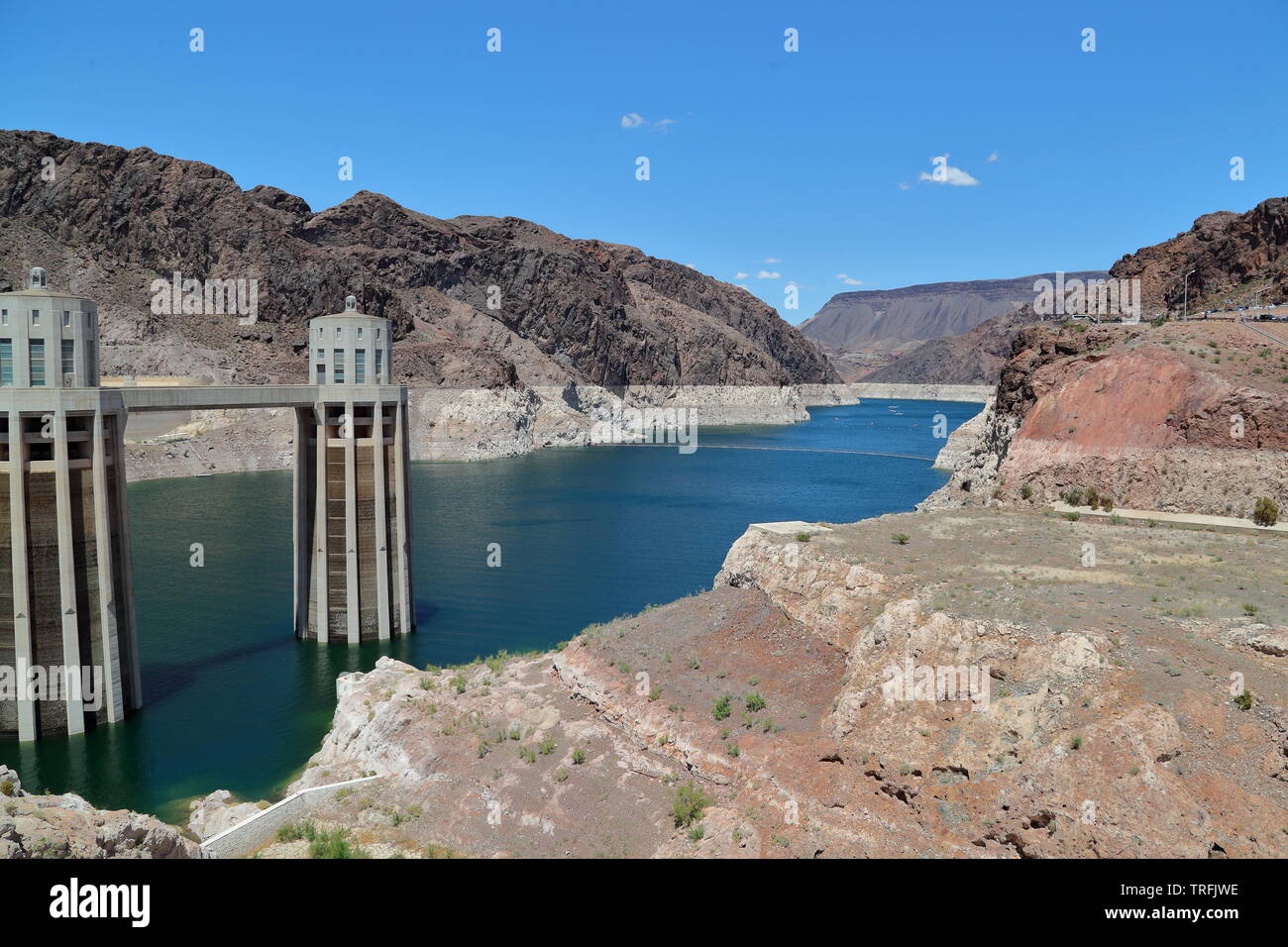 The Hoover Dam is a concrete arch-gravity construction linking Nevada and Arizona and created the largest water reservoir in the USA Stock Photo