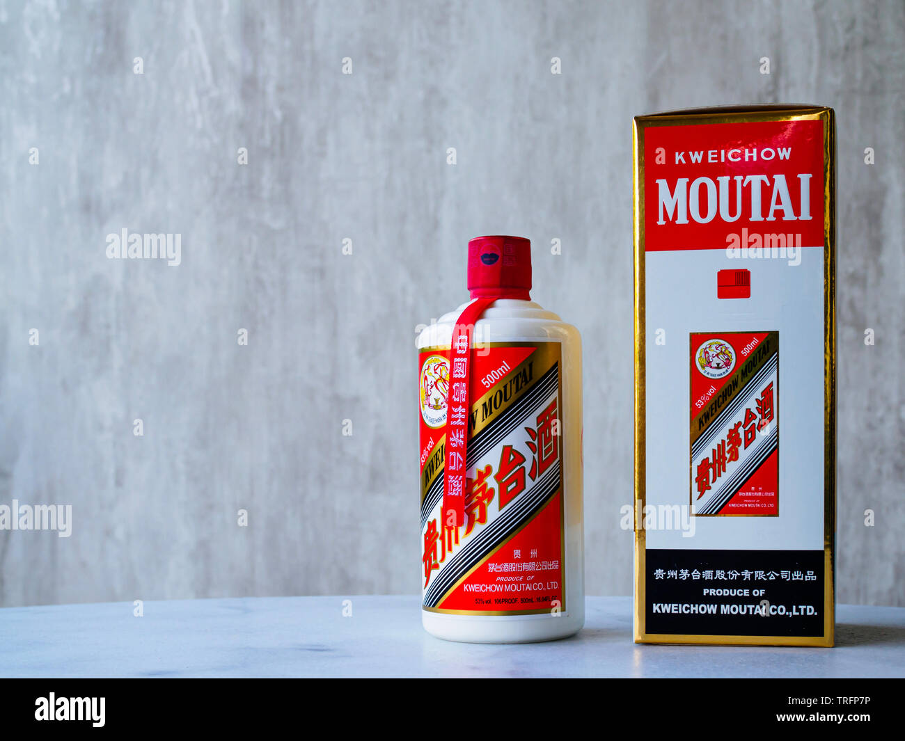 A bottle of Maotai baijiu liqour alongside the original packaging. Maotai is a famous Chinese liqour of much cultural significance from Guizhou, China Stock Photo