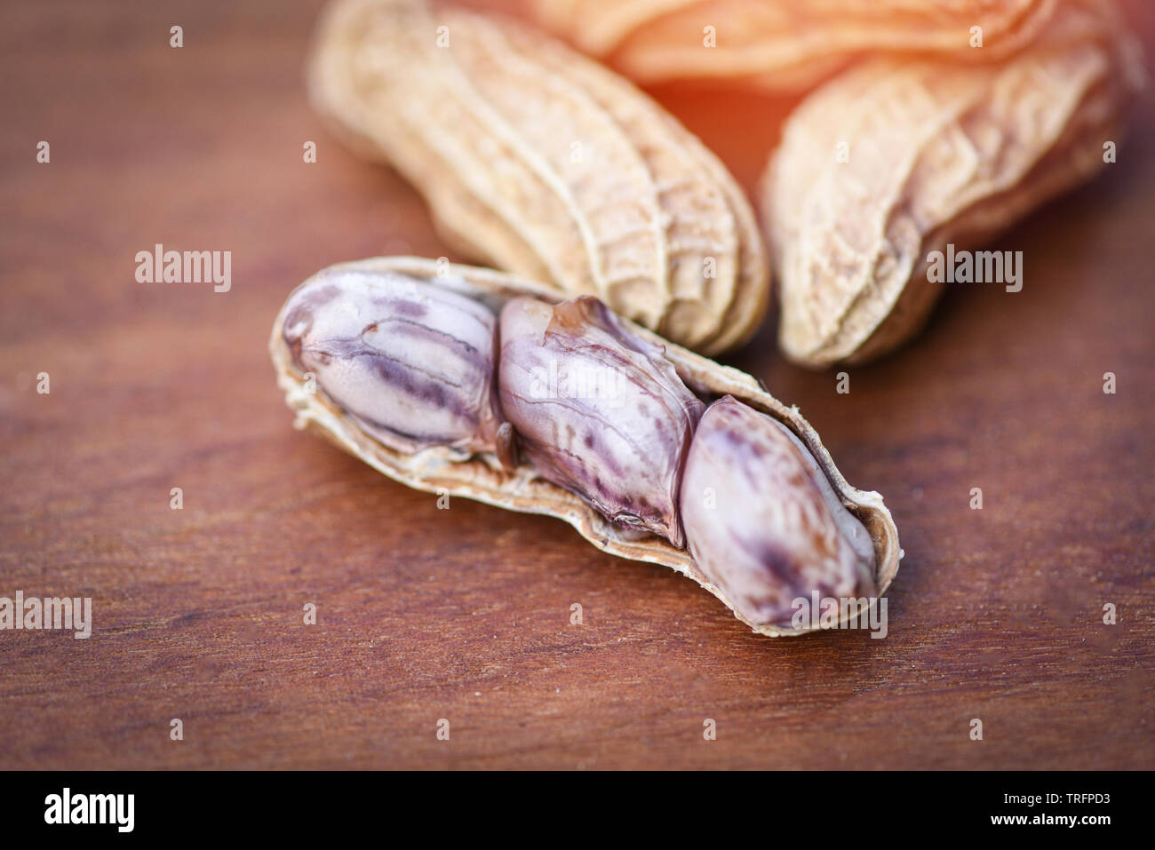 Peanut on wood background / Boiled peanuts peeled Stock Photo