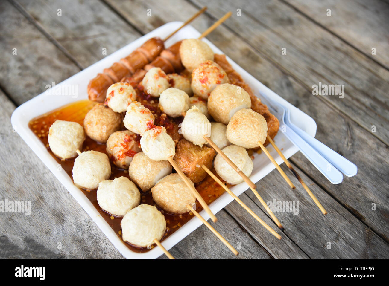 Squid grilled ball on wooden plate hi-res stock photography and images -  Alamy