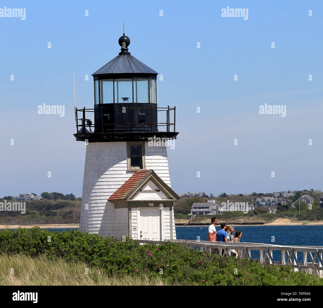 Nantucket, Massachusetts - May 26, 2019: Group of tourists on Brant Point lighthouse on Nantucket Island, Massachusetts Stock Photo