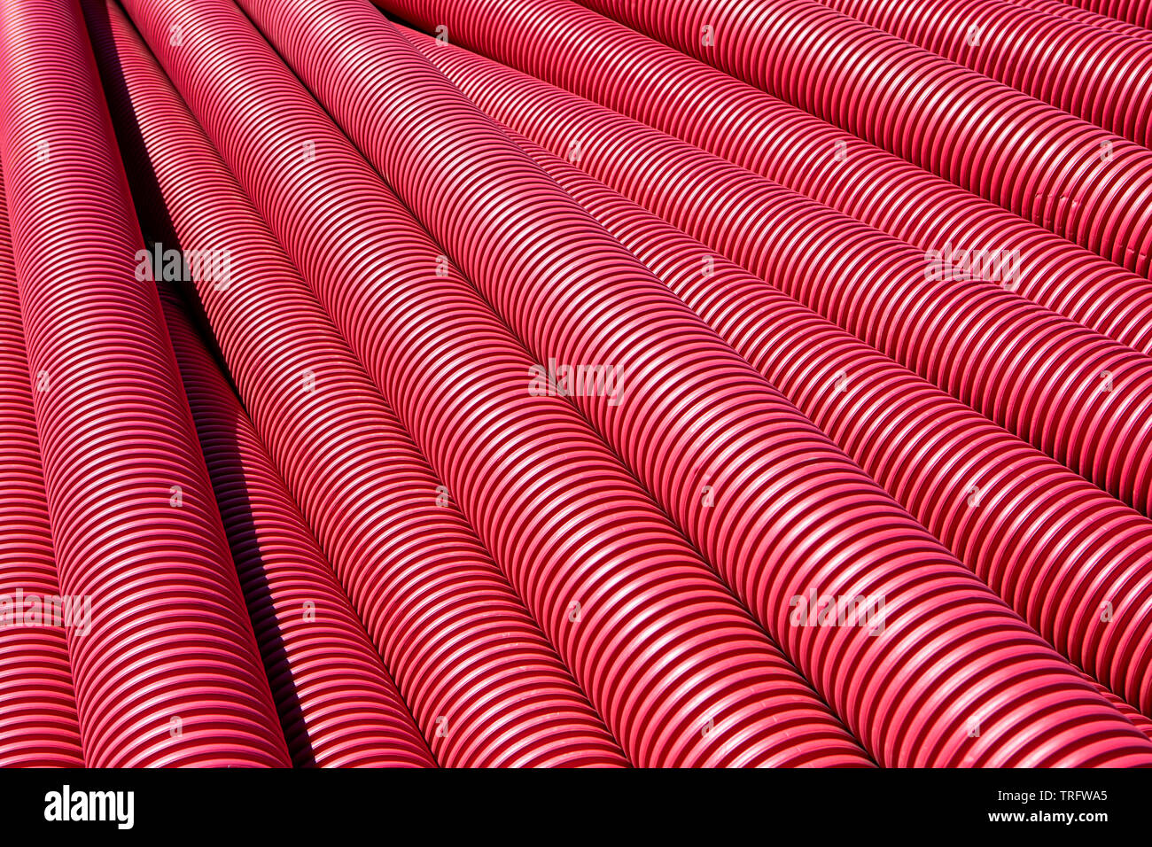Red plastic pipes Stock Photo Alamy