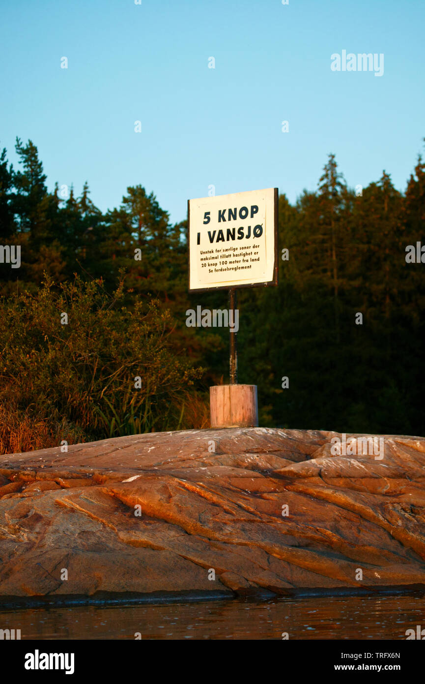 Sign showing speed limit for boats in the lake Vansjø in Østfold, Norway. Vansjø is a part of the water system called Morsavassdraget. September, 2006. Stock Photo