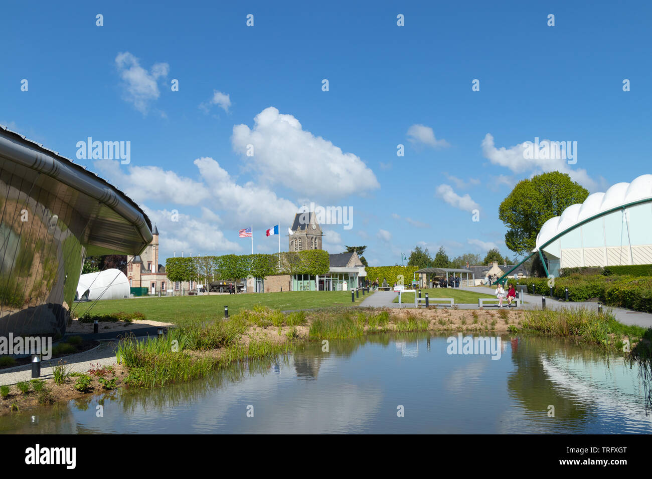 sainte mere eglise, France - May 5, 2019: View from the Airborne museum on the town and church of sainte mere eglise. Stock Photo
