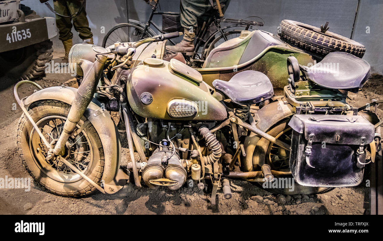 Colleville sur Mer, France - May 5, 2019: Military BMW R75 motorcycle with sidecar in the Overlord museum at Normandy France. Stock Photo
