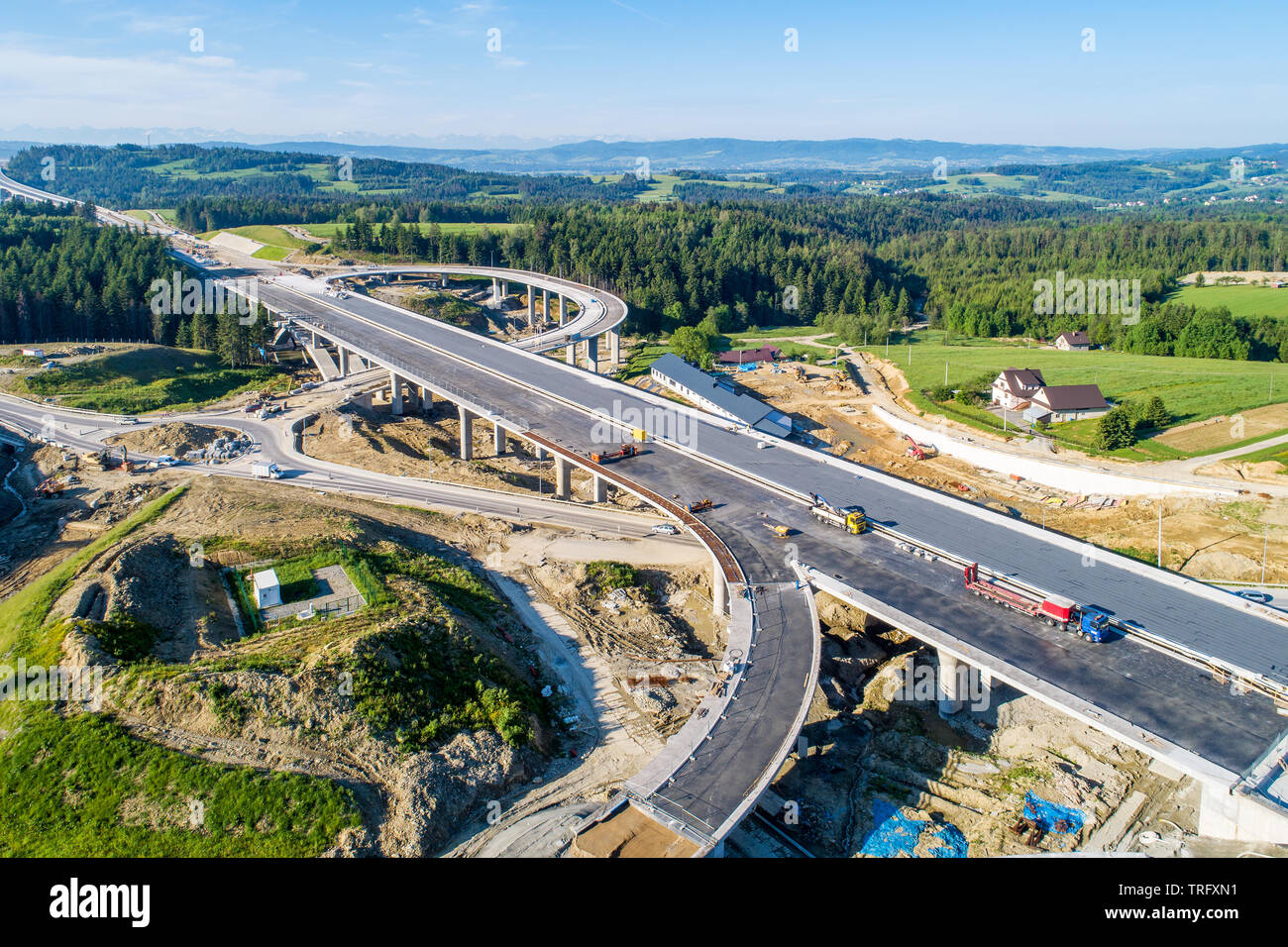 New highway under construction in Poland on national road no 7, E77, called Zakopianka.  Overpass crossroad with traffic circles and viaducts near Nap Stock Photo
