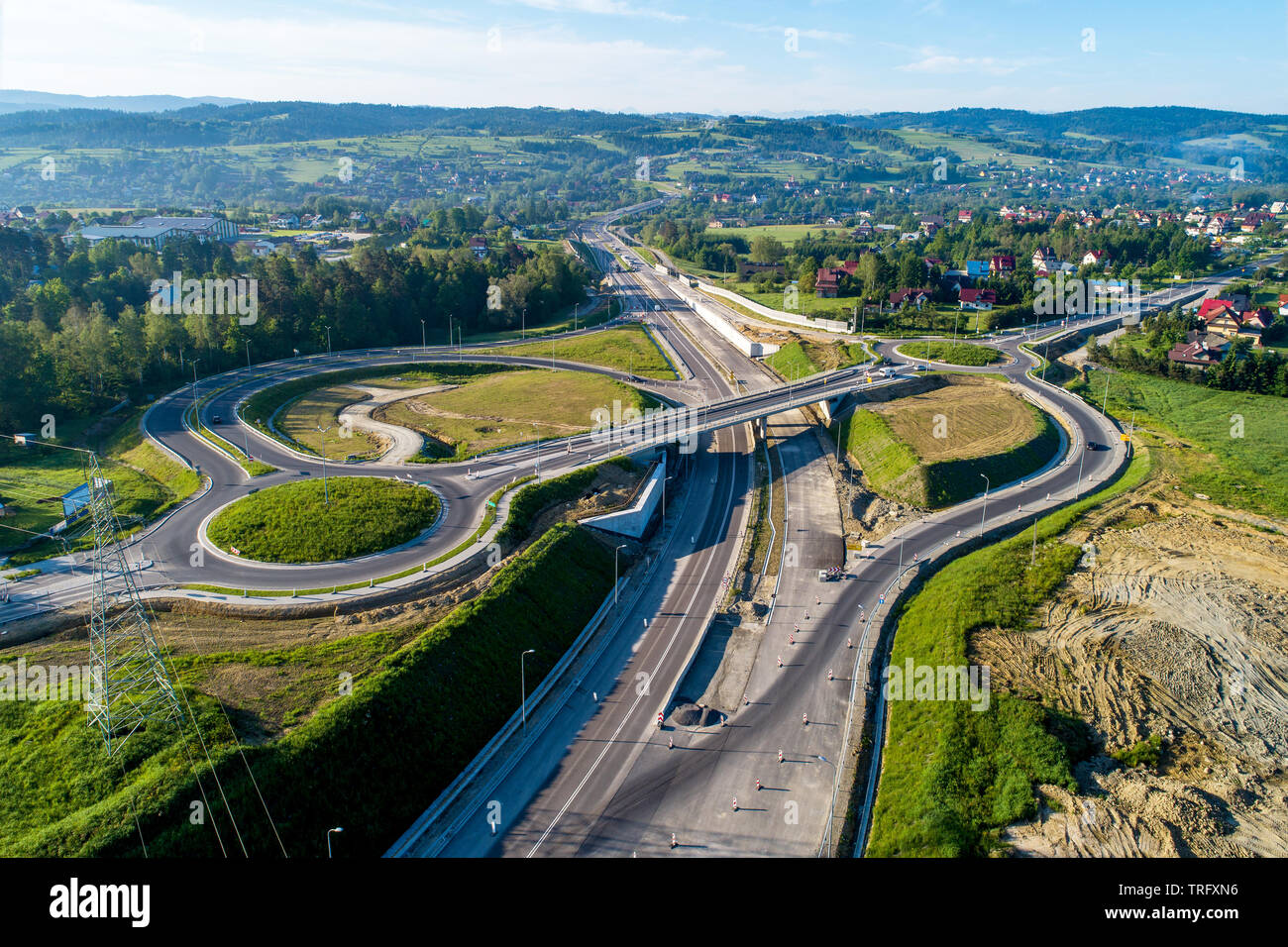 New highway under construction in Poland on national road no 7, E77, called Zakopianka.  Overpass crossroad with traffic circles and viaducts near Rab Stock Photo