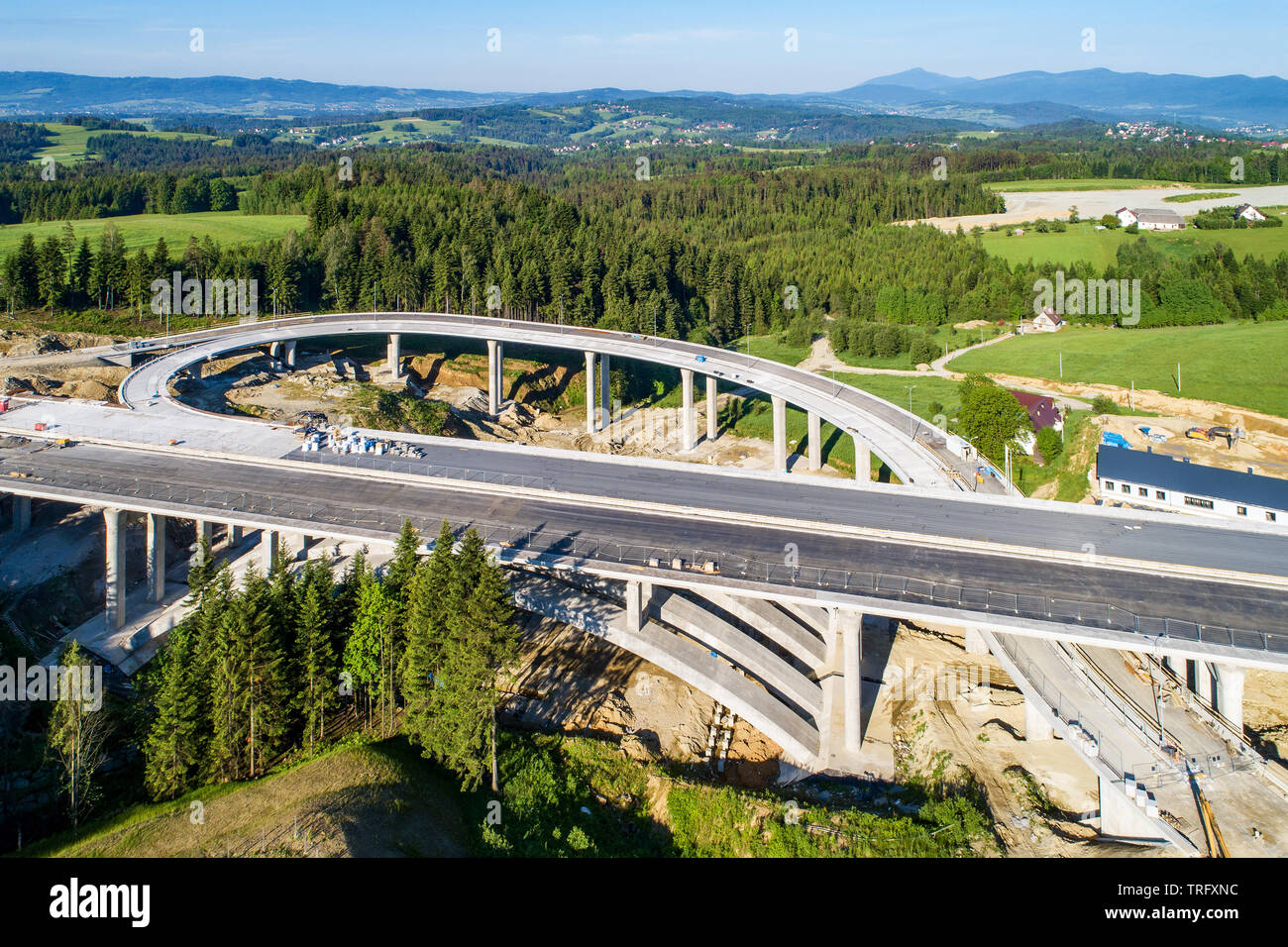 New highway under construction in Poland on national road no 7, E77, called Zakopianka.  Overpass crossroad with  viaducts and arc near Naprawa villag Stock Photo