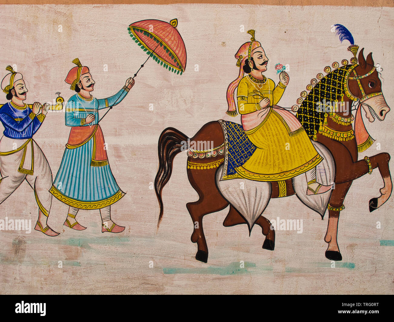 Wall painting in Udaipur, Rajasthan, India, depicting a royal procession  with a Maharaja on horseback shielded by a ceremonial parasol Stock Photo -  Alamy