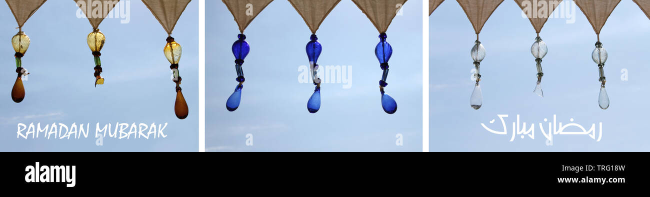 Greetings for the muslim holy month of Ramadan, Eid al Fitr, with arabesque glass beads. Stock Photo