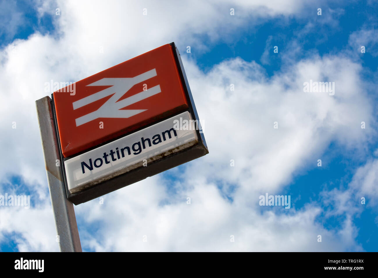 Nottingham train station sign with blue white cloudy sky Stock Photo