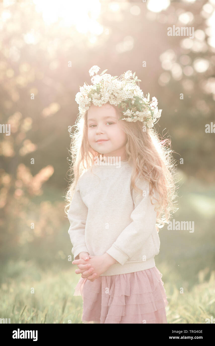 Cute baby girl 4 5 year old wearing stylish skirt and sweatshirt