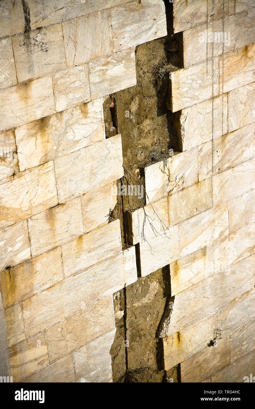 Stone slab detached due to infiltration of water - toned image Stock Photo
