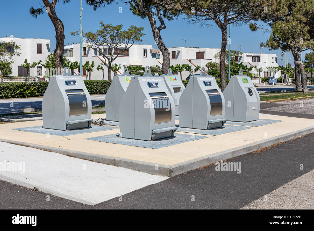 Refuse and recycling bins in Le Barcares, South of France Stock Photo