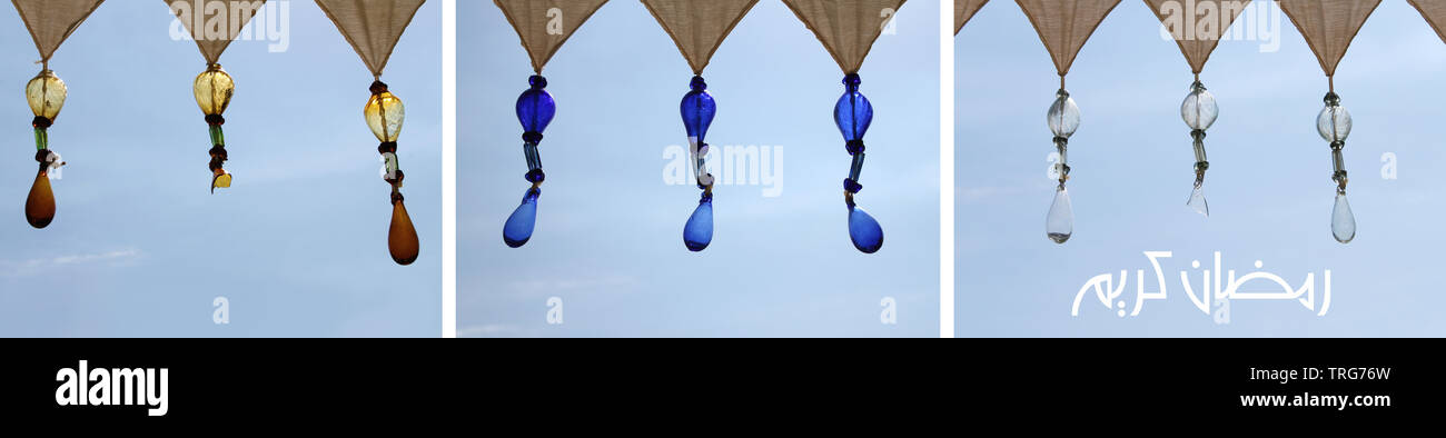 Greetings for the muslim holy month of Ramadan, Eid al Fitr, with arabesque glass beads. Stock Photo