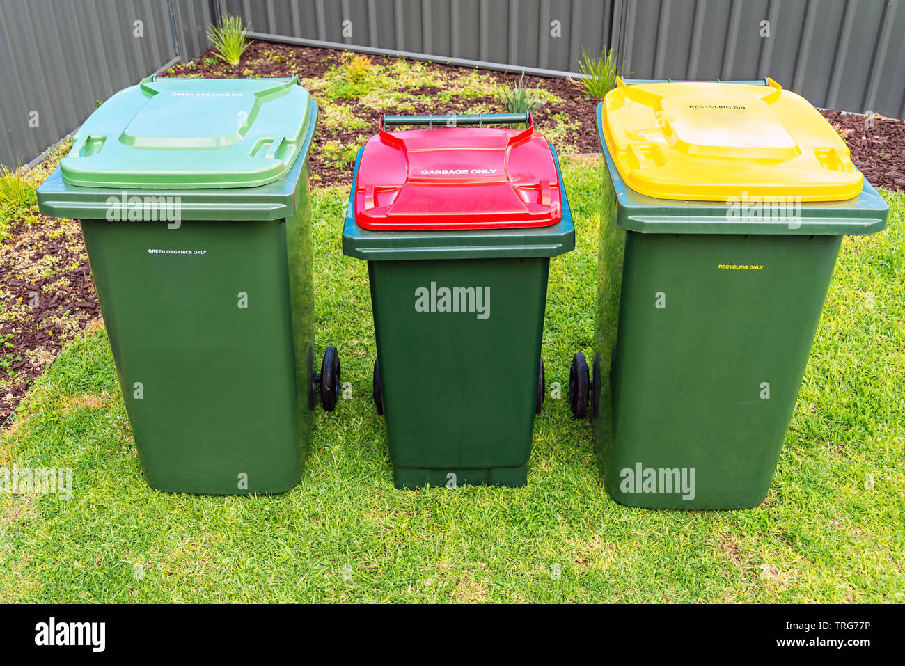 Top view of australian garbage wheelie bins for recycling, general and green waste provided by local council Stock Photo