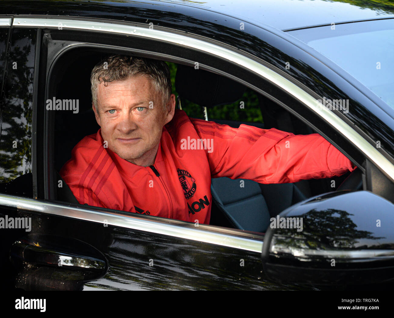 Manchester United Manager Ole Gunnar Solskjaer posing for a photograph on his was to training. Stock Photo