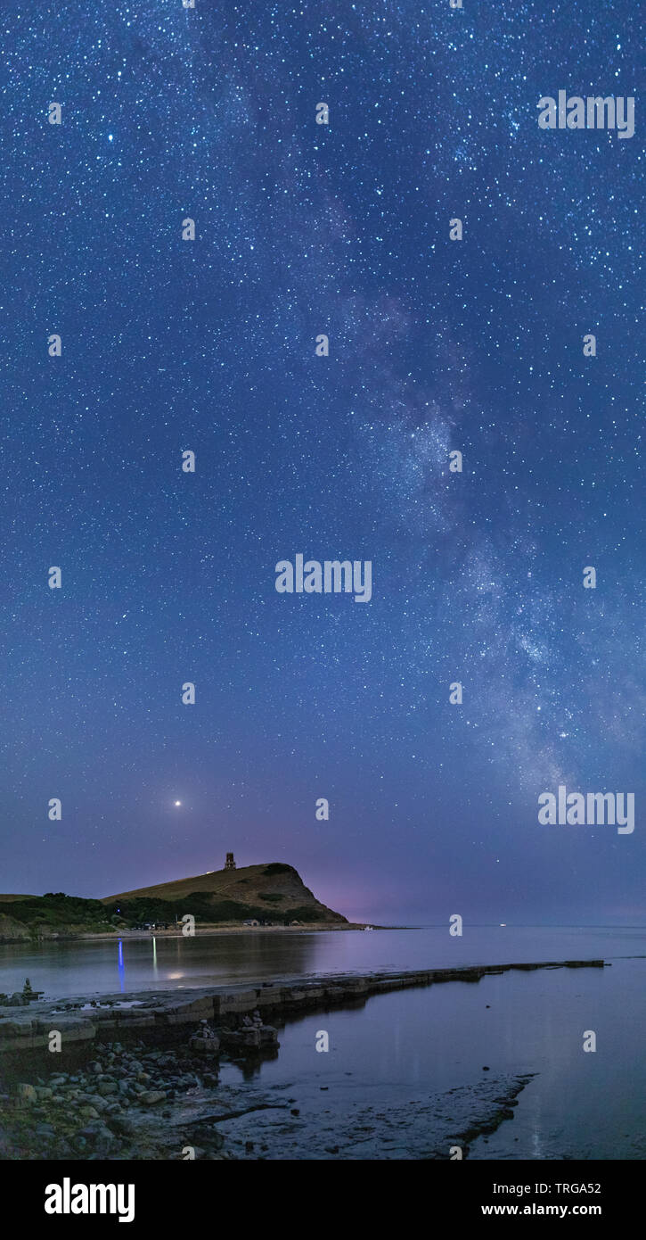 The Milky Way over Kimmeridge Bay and Clavell Tower, Jurassic Coast, England, UK Stock Photo
