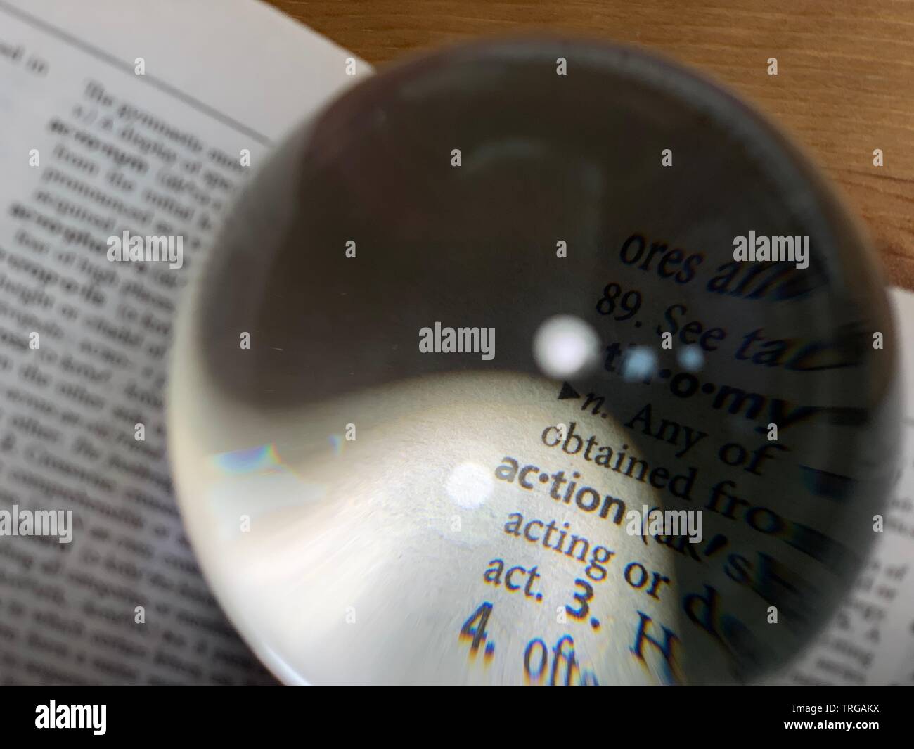 crystal ball on the dictionary Stock Photo Alamy