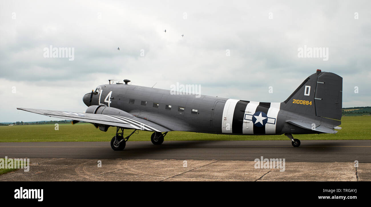 Dakota C47 troop transport aircraft in D-day invasion stripes at Duxford Stock Photo