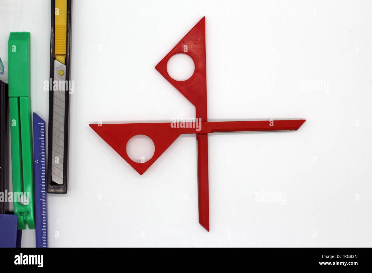 Scissors, cutter ando other stationery objects, isolated on a white background Stock Photo